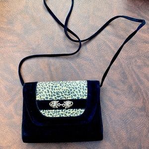 Small black suede-like purse.